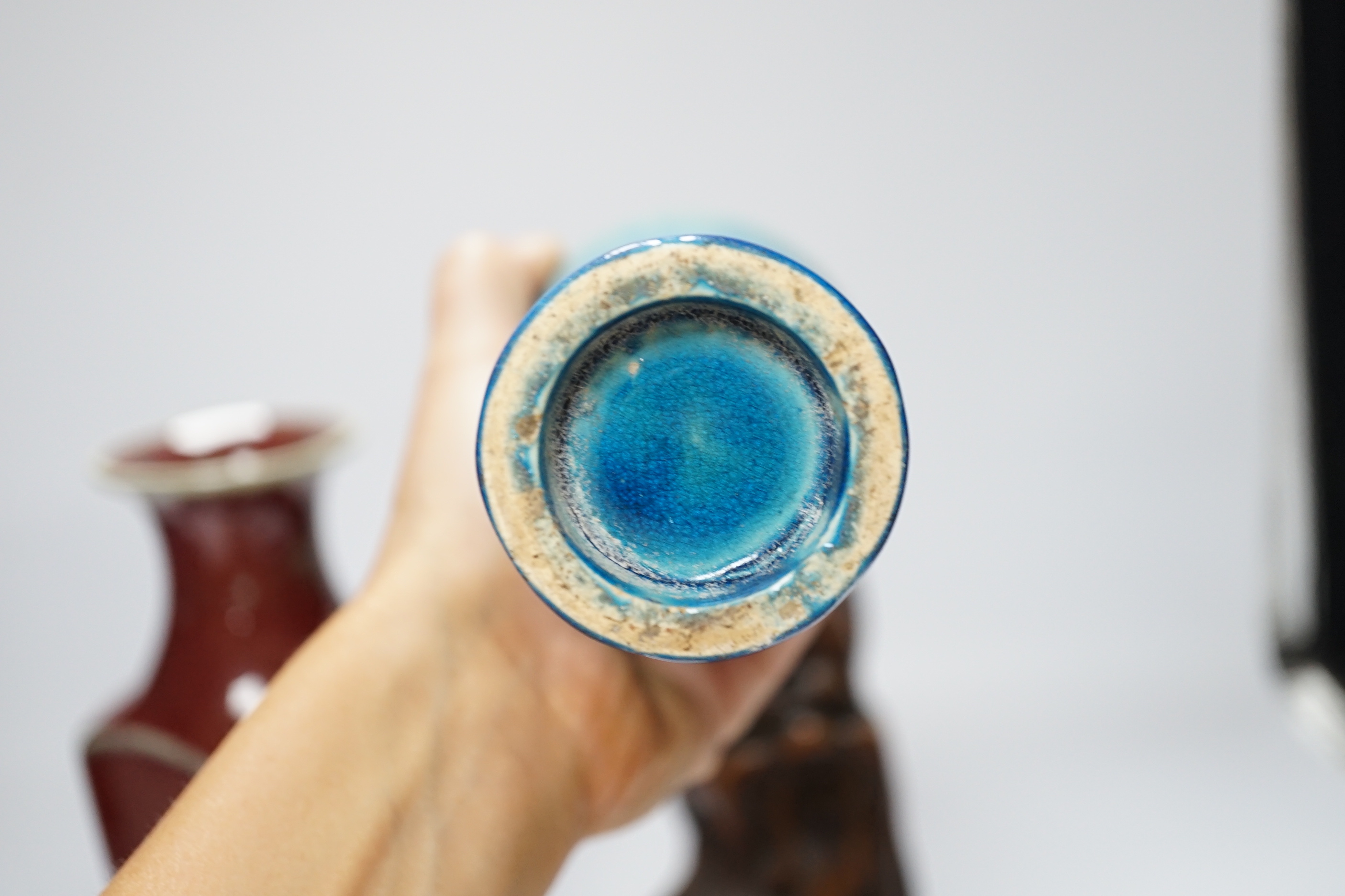 A Chinese sang-de-boeuf vase, a hongmu head, a Japanese Satsuma jar, a blue and white vase, and a turquoise and cream glazed vase etc, tallest sang-de-boeuf vase 25.5 cm high